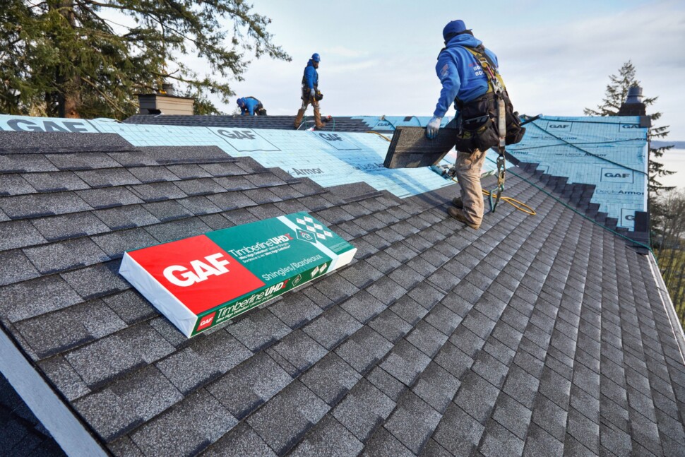 Contractor installing GAF residential roofing products on an Iowa home