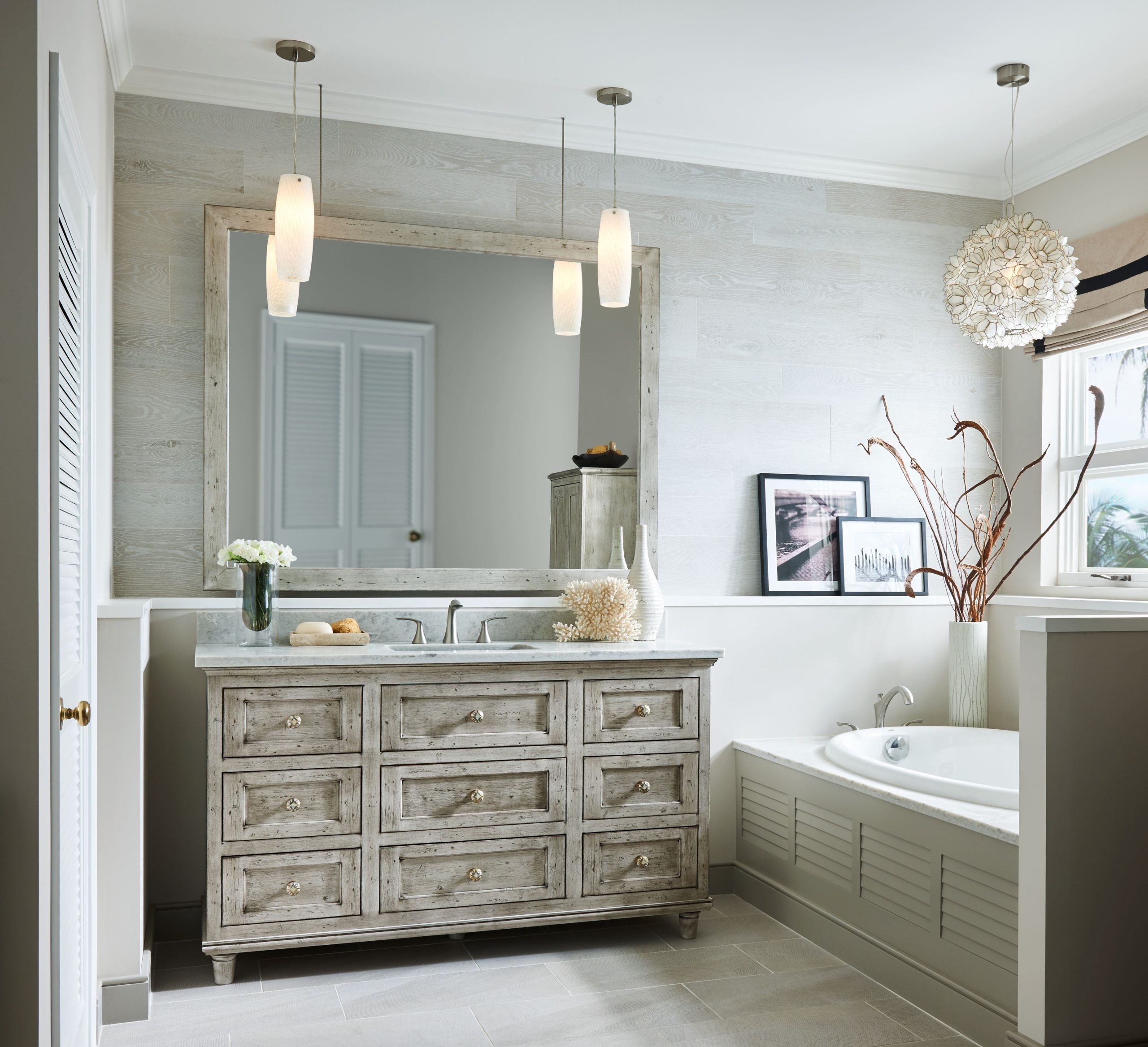Bathroom cabinetry with drawers and linen storage