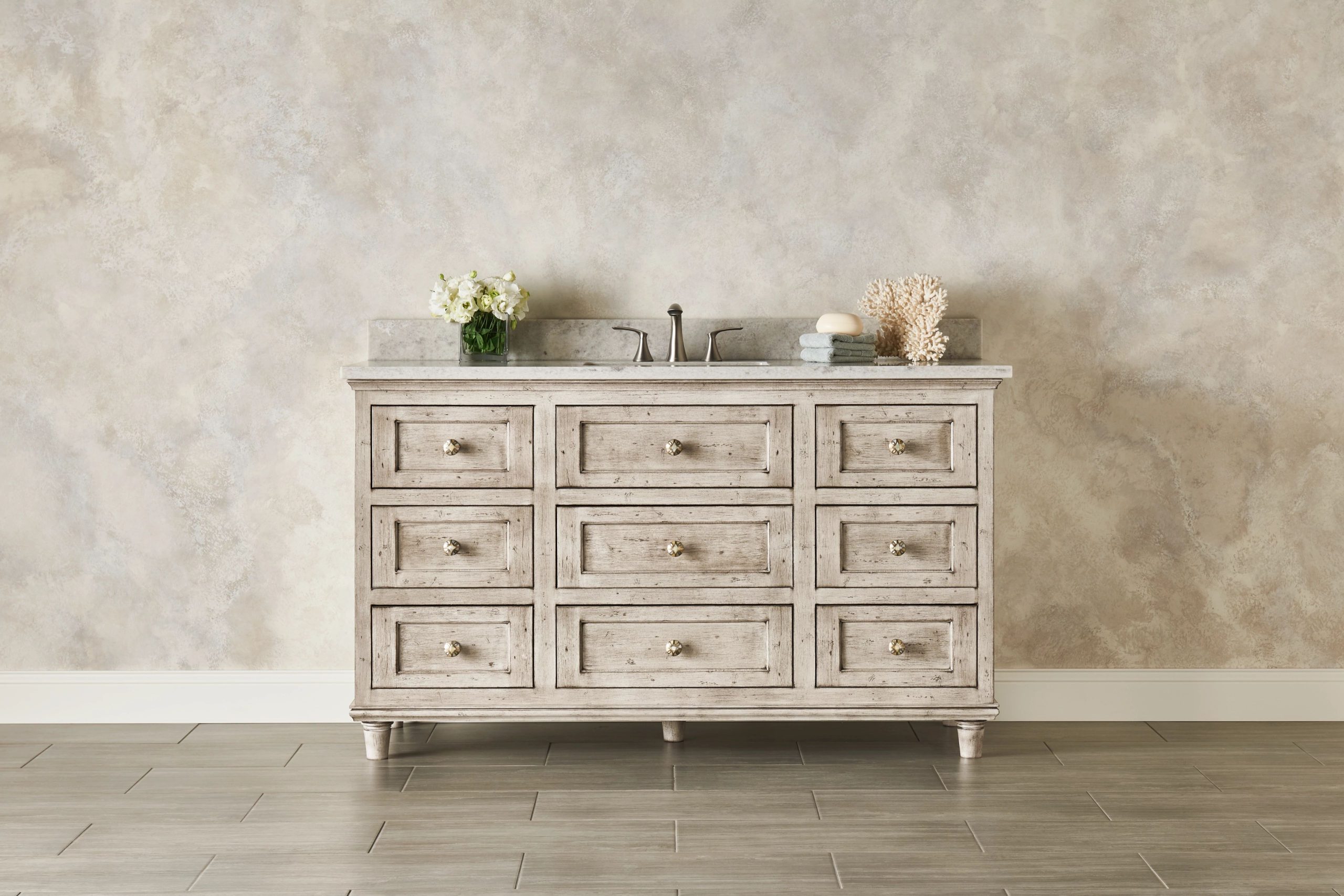 Bathroom cabinetry with drawers and linen storage