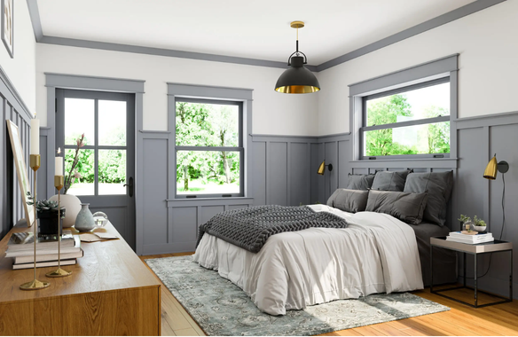 bedroom with wainscoting, panel moulding and crown moulding
